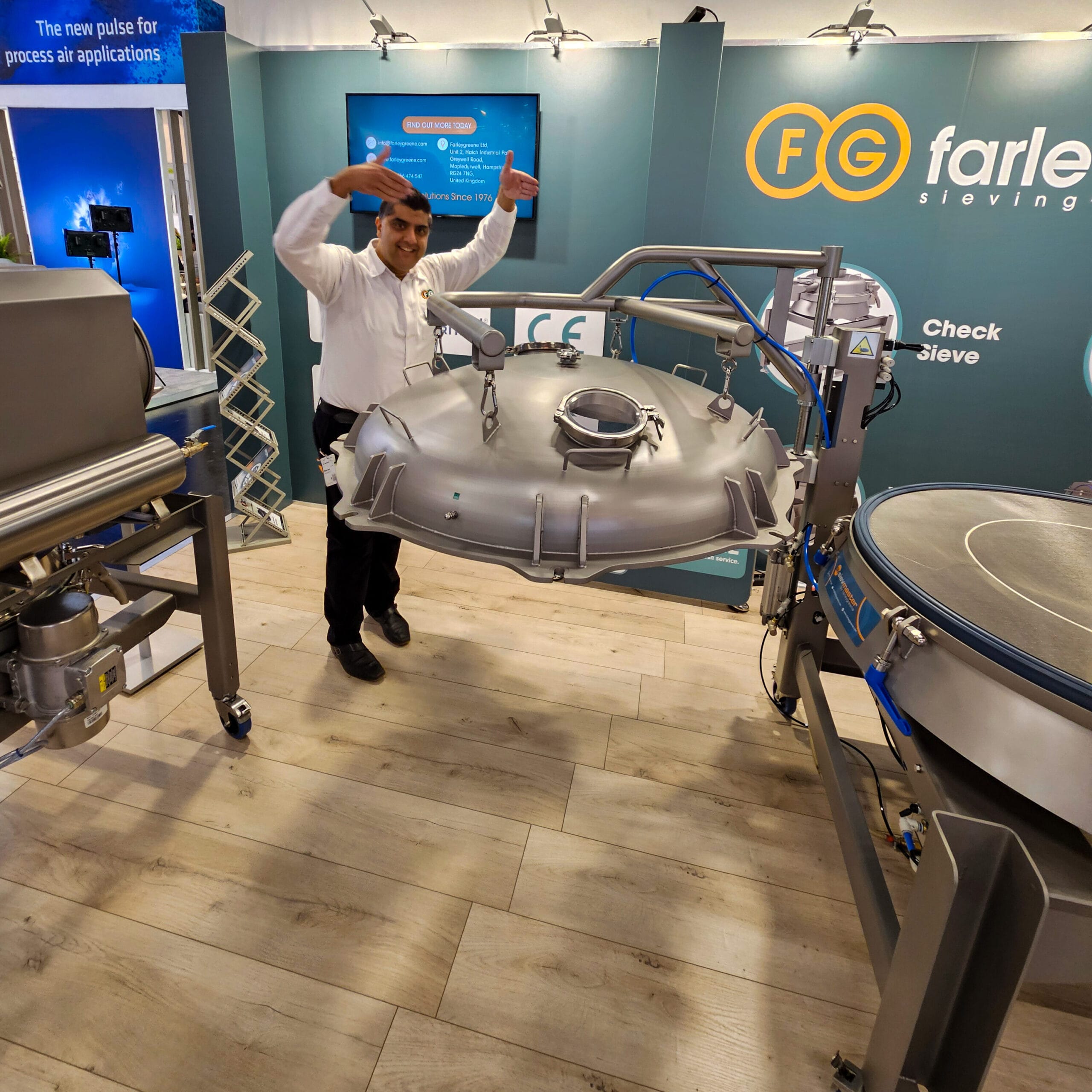 Rehan Tariq, Farleygreene Area Sales Manager, at the POWTECH 2025 exhibition stand with our Gallery Lifting Equipment