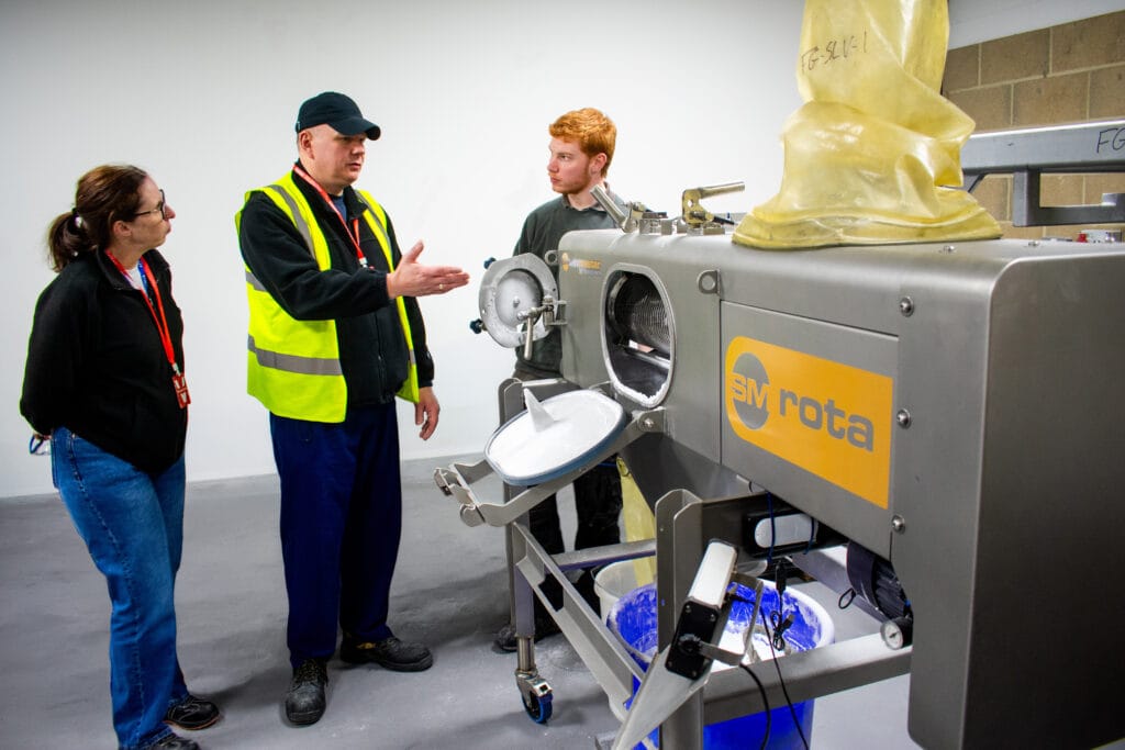 Farleygreene Production & Test Technician, Dan Smith demonstrating the SM Rota rotary sieve to customers during an in-house sieving test